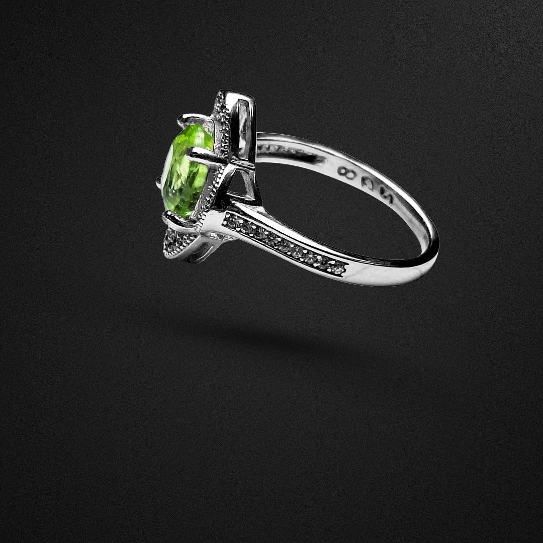 انگشتر نقره زنانه زبرجد آفریقایی گل چهار برگ