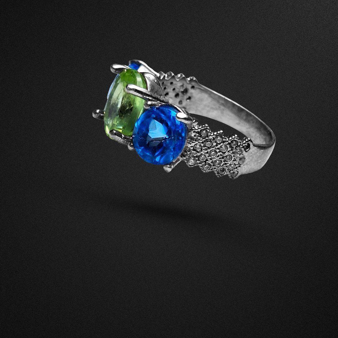 انگشتر نقره زنانه سه نگین زبرجد آفریقایی و توپاز سوئیس